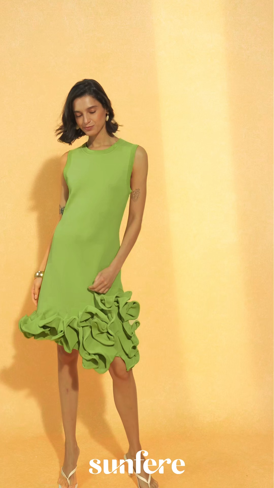 Making Memories Green Sleeveless Ruffle Hem Knit Mini Dress